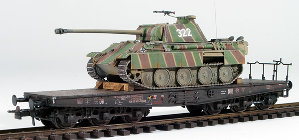 REI Models 6870228 -  German WWII Panther Summer Striped Camo with battle damage loaded on a heavy 6 axle DRB flat car